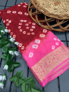 Maroon and baby pink color hand bandhej silk saree with zari weaving work