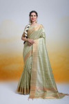 Pista green color tussar silk saree with zari woven work