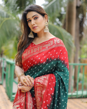 Green and red color hand bandhej silk saree with zari weaving work