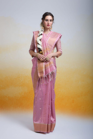 Baby pink color tussar silk saree with zari woven work
