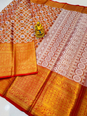 Orange color kanchipuram silk saree with woven design