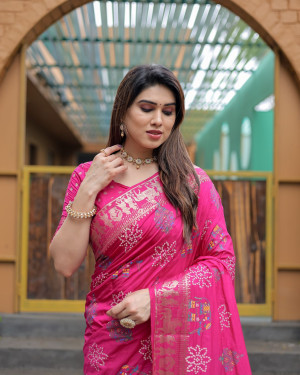 Rani pink color hand bandhej silk saree with printed work