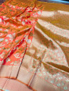 Peach color kanchipuram handloom silk saree with silver and golden zari work