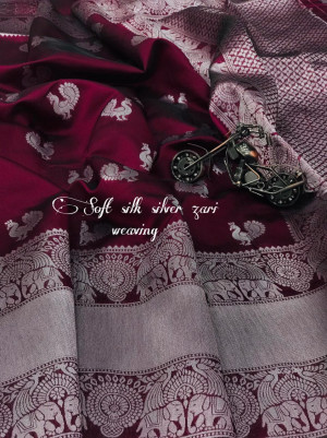 Magenta color banarasi silk saree with silver zari weaving work