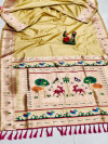 Light yellow color paithani silk saree with golden zari weaving work