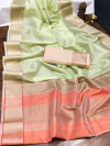 Pista green color organza silk saree with woven work
