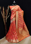 Peach color soft banarasi silk saree with golden and silver zari work
