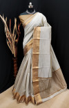 Gray color soft  silk saree with golden zari border