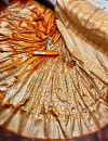 Mustard yellow color soft banarasi silk saree with golden zari weaving design