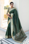 Green color tussar silk saree with zari weaving border