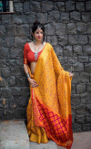 Yellow color patola silk saree with zar weaving work