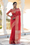 Red color tussar silk saree with zari weaving border