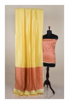 Yellow color metallic linen saree with silver zari border
