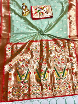 Pista green color paithani silk saree with weaving work