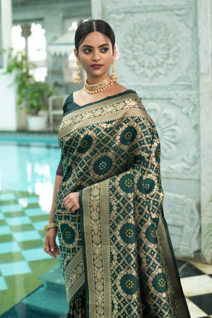 Dark green color bandhani saree with zari weaving work
