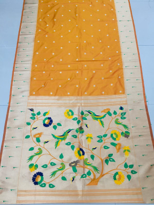Yellow color paithani silk saree with weaving work