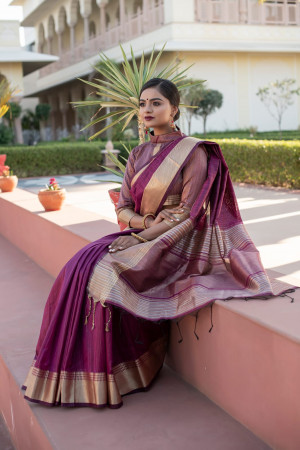 Magenta color tussar silk saree with zari weaving border