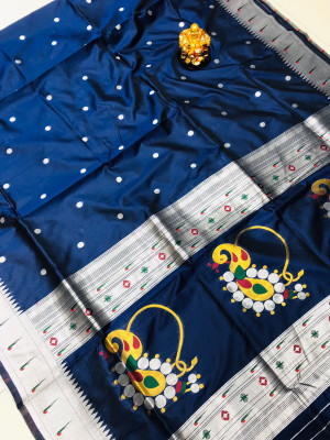 Navy blue color soft paithani silk saree with silver zari weaving work