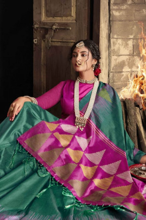 Rama green color raw silk saree with woven design