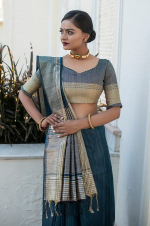 Blue color tussar silk saree with zari weaving border