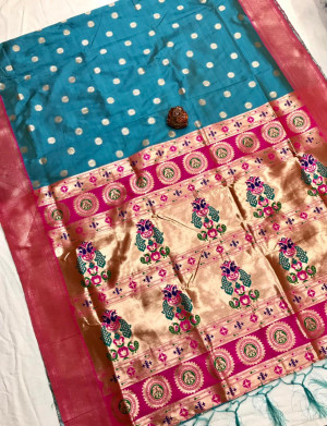 Sky blue color soft kanchipuram silk saree with zari weaving work