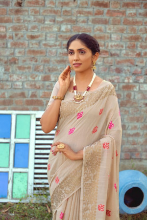 Beige color soft chanderi cotton saree with contrast woven work