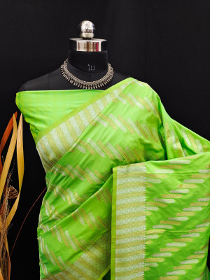 Parrot green color soft banarasi silk saree with golden and silver zari work