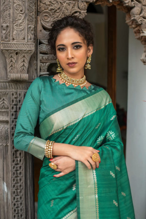 Green color tussar silk weaving saree with zari woven butti
