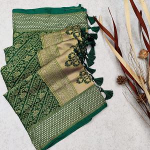 Dark green color soft banarasi silk saree with woven work