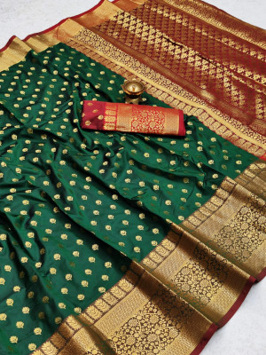 Dark green color soft banarasi silk saree with zari woven rich pallu and border