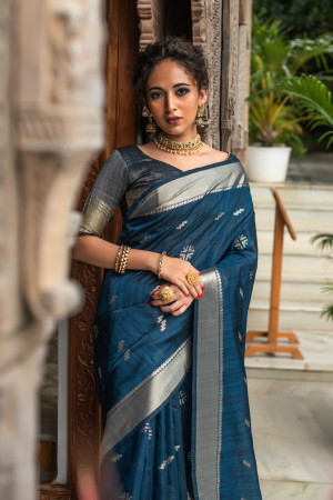 Navy blue color tussar silk weaving saree with zari woven butti