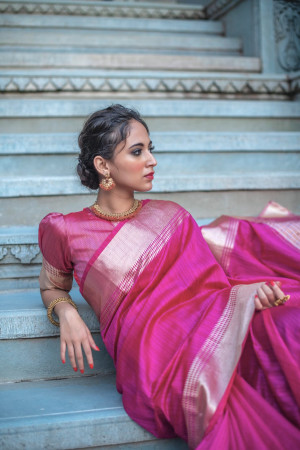Pink color tussar silk saree with zari weaving border