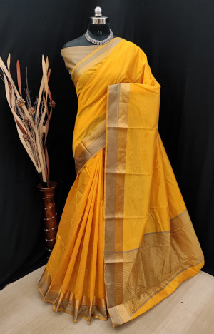 Yellow color soft  silk saree with golden zari border