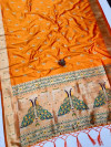 Orange color paithani silk saree with gold zari weaving work