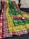 Green and magenta color cotton saree with patola printed work