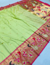 Parrot green color paithani silk saree with mina zari border
