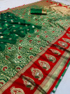 Green color kanchipuran silk saree with zari weaving work