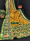 Mustard yellow and green color cotton saree with patola printed work