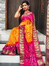 Orange and pink color bandhani saree with hand bandhej print