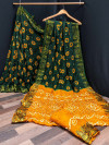 Green and yellow color rich bandhani silk saree with jacquard weaving work