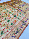 Off white color patola silk saree with zari weaving work