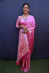 Rani pink color muslin silk saree with zari weaving work