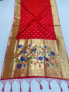 Red color paithani silk saree with gold zari border