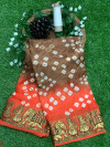Beige and orange color soft bandhani saree with hand bandhej print