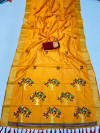 Mustad yellow color soft raw silk saree with woven desing