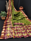 Mehandi green  and maroon color cotton saree with patola printed work