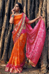 Orange and pink color hand bandhej bandhani silk saree with zari weaving work