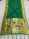 Green color paithani silk saree with gold zari border