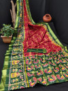 Red and green color cotton saree with patola printed work