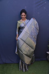 Gray color muslin silk saree with zari weaving work